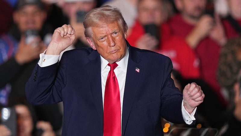 President Donald Trump dances to music after speaking at the Mount Airy Casino Resort in Mount...