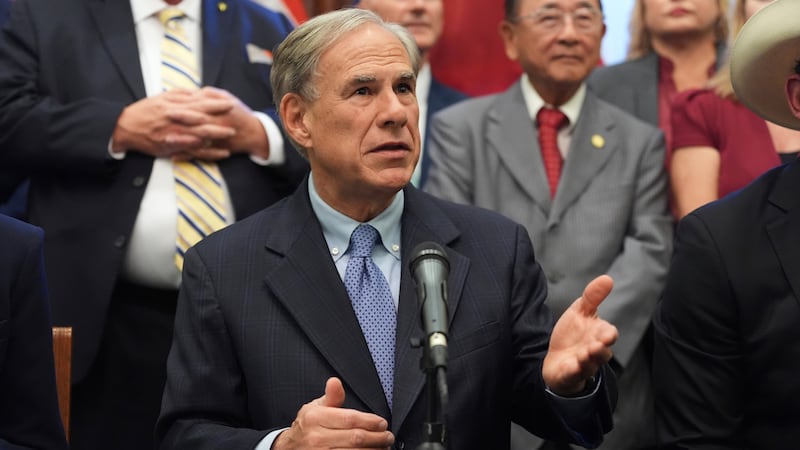 Texas Gov. Greg Abbott speaks to the media following a bill signing as Texas senators debate a...