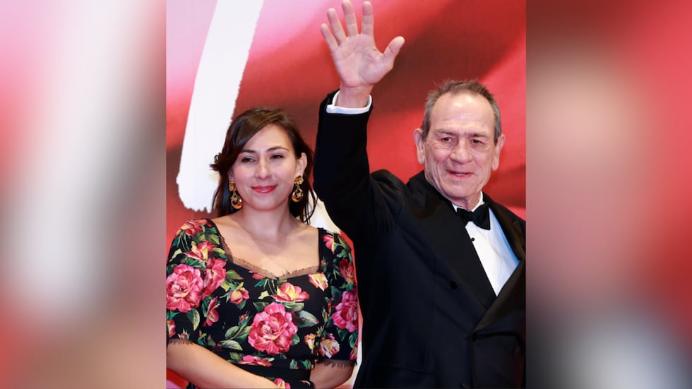 FILE -- Tommy Lee Jones waves for fans with his daughter Victoria Jones during the opening...