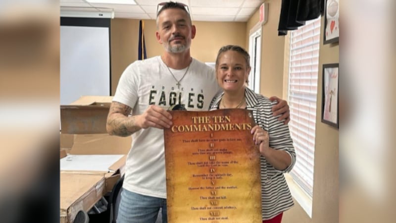 Community donates Ten Commandment posters for every classroom at Rogers ISD
